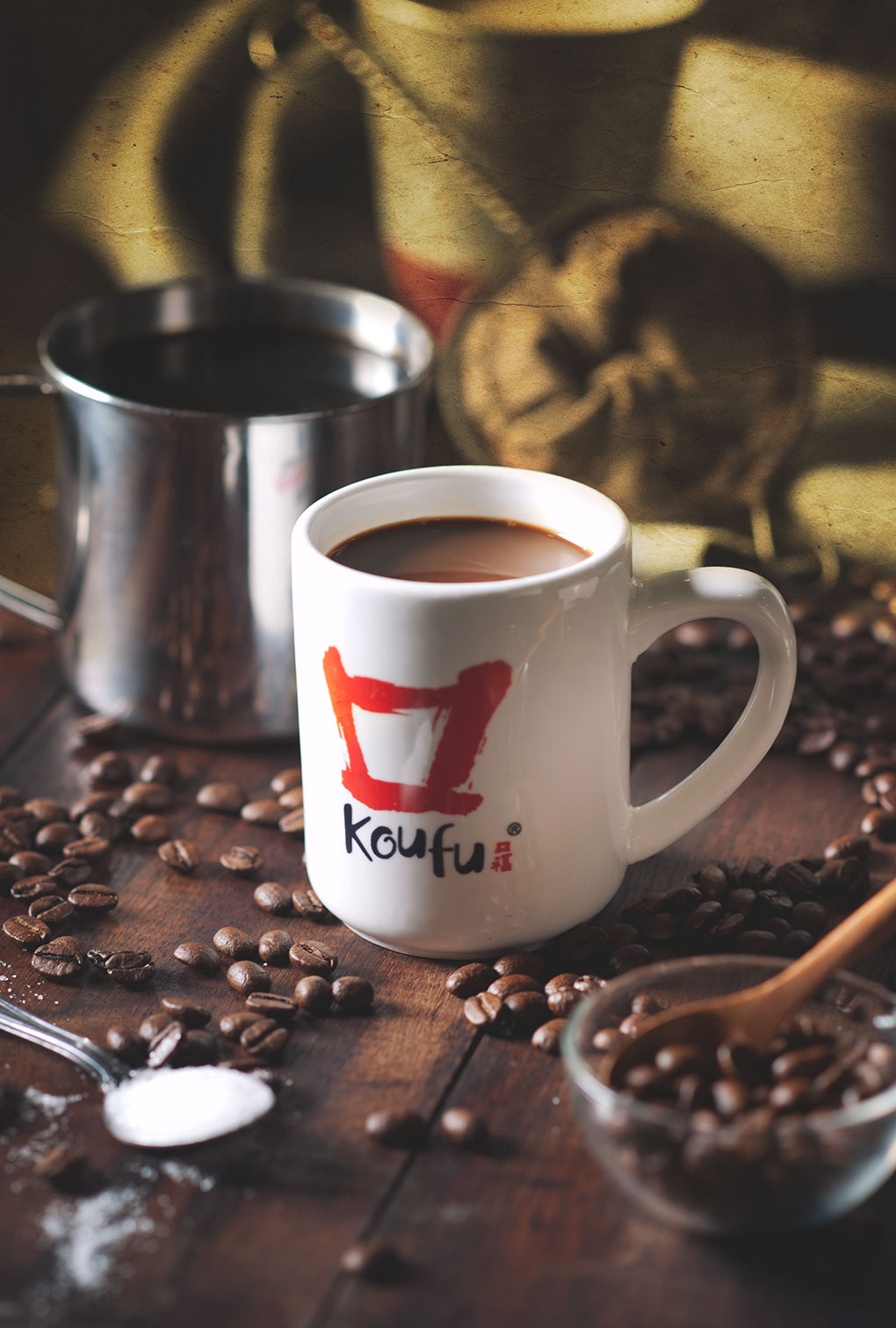 Official Koufu photograph of coffee in a branded Koufu mug